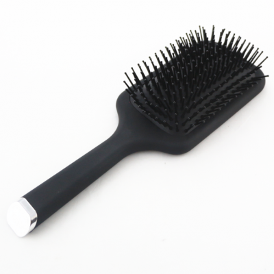 black rubberized  paddle hair brush