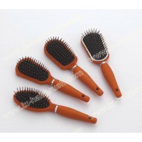 Orange color plastic cushion hairbrush set